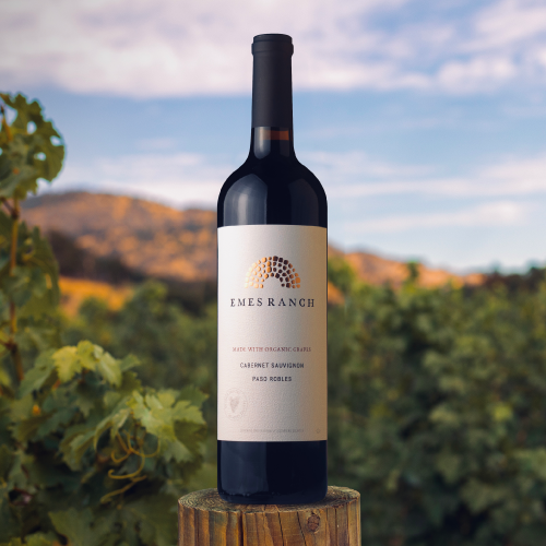 Emes Ranch her image of bottle in vineyard